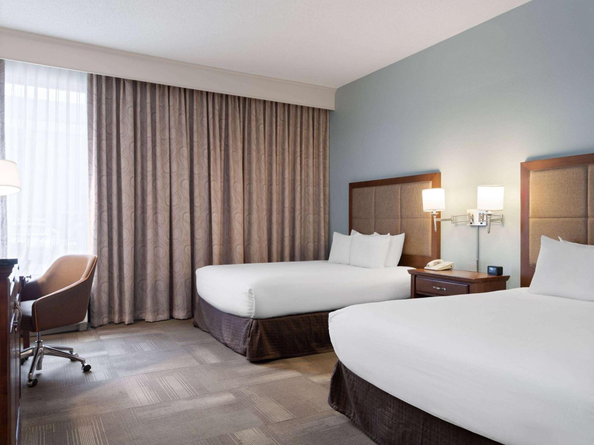Queen Room with Two Queen Beds, Mobility Access and Roll-In shower, Non-Smoking